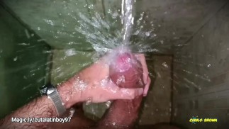 No hands water masturbation. Letting the stream of water fall on my big uncut cock until I cum