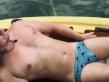 Smooth white daddy jerks his uncut cock in his kayak. 
