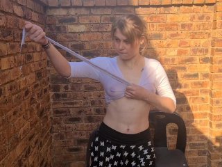 Slut in cotton crop top and skirt, wetting her_shirt, playing with her boobs outside in the_garden