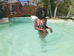 Elegant Delicate African Beauty enjoying the Swimming pool