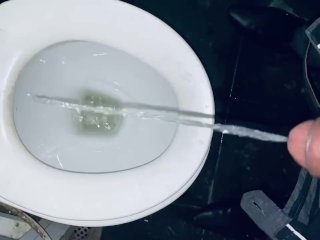 Hot public pissing at the common restroom