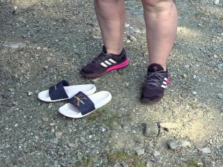 Mature BBW MILF changing shoes outdoors.