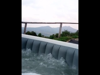 Jacuzzi Vacation Time. Sitting in a Jacuzzi between the Mountains in the Morning.