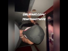 JewishHotWife sucks married strangers cock in gloryhole booth while strangers watch