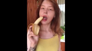 She Sexually Eats A Banana While Exposing Her Breasts