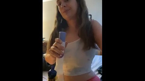 Cannabis Queen Smokes Dab From Bong Then Kisses and Winks at You