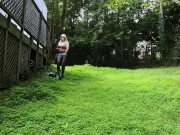 Preview 4 of Big fake tits halter top Daisy Dukes wearing crossdresser cutting the grass