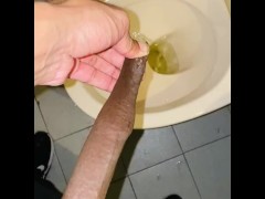 Pissing foreskin fetish at the gym bathroom 