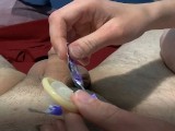 Little quick handjob with a condom until total ejaculation in the bottom of the condom