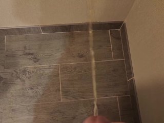 Pissing and cumming on the hotel bathroom floor
