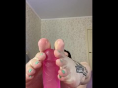 Loves to suck big dicks. Jerking off a dick with his feet.