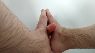 Young guy masturb sextoy with feet foot and hand