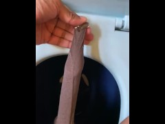 Video Foreskin play piss fetish pull foreskin uncut cock piss on the commode seat best pissing foreskin
