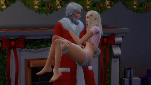 Kerstman heeft seks met jonge blondine die op hem wachtte bij de open haard