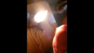 Extinguish a candle flame with cum