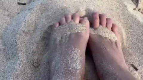 Playing with my hawaiian feet in the sand