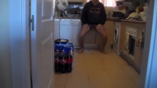 John is Pissing all over the Kitchen Floor