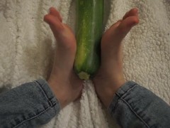 simulating footjob with an huge zucchini by a virgin cute girl