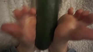 simulating footjob with an huge zucchini by a virgin cute girl