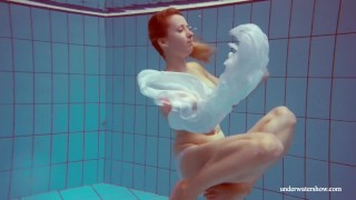 Melisa Darkova A Redhead With A Big Booty Is A Swimmer With Big Tits