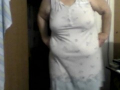 a big woman in nightgown