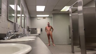 Public Exhibitionist naked and jacking in public restroom