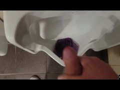 johnholmesjunior does a quick jerk off in open urinal movie theater bathroom