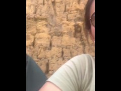 Two lesbians touch each other to orgasm on the corner of a town trying to avoid being seen by anyone