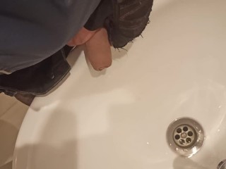 Guy Pisses in the Sink