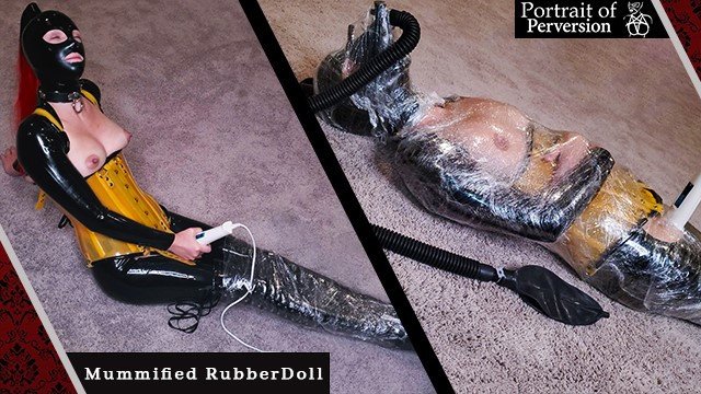 Watch Bondage Video:RubberDoll Gets Mummified & Made to Cum: A Latex Loving Girl Wrapped in Plastic Cums on a Magic Wand