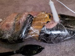RubberDoll Gets Mummified & Made to Cum: A Latex Loving Girl Wrapped in Plastic Cums on a Magic Wand