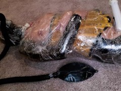RubberDoll Gets Mummified & Made to Cum: A Latex Loving Girl Wrapped in Plastic Cums on a Magic Wand
