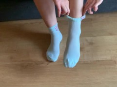 Sexy girl tries her new pretty white sport socks