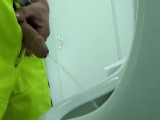 construction worker pissing at work, close up