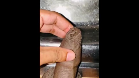 Uncut asian black dick sink peeing with hot long foreskin pulled in a fetish way black cock lovers 