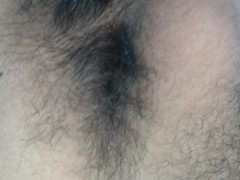 hairy man shows his uncut cock