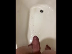 Guy desperately holding his piss until he loses control, spraying his piss everywhere,then orgasming