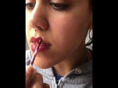 Sexy Argentinian teen puts on makeup while smoking.
