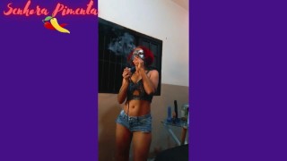 Senhora Pimenta Performs A Striptease While Sensually Smoking A Charuto