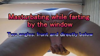Japanese girl farting while masturbating by hotel window