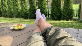 Next relaxing day for Queen. My feet in short socks on the table.