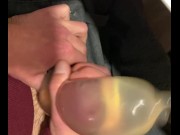Preview 1 of Young man using a condom full of urine to masturbate and cum