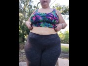 Preview 2 of Voyeur thick body in the park, bubble butt tight yoga pants stretching.