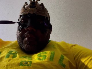 Ssecnirpnailati In a yellow Brazil Futball shirt