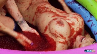 Kissing turns into food wrestling between the two brunette lesbians with fake boobs