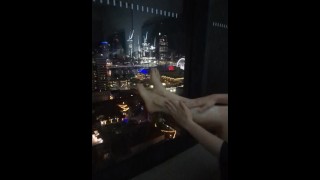 Foot stroking in the night city