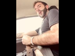 Stroking my exposed big hairy cock in my car while people pass by in public teaser