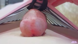 Close up playing with vibrator on cock and cum on tummy