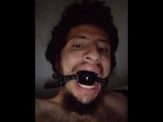 Gagged Boy Spitting in himself while Wanking his Big Cock