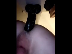 Slut fucked by black dildo doggy